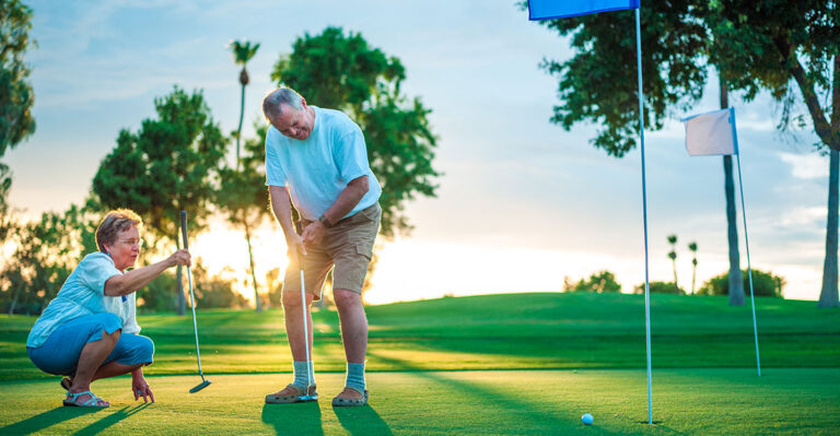 senior couple golfing in florida